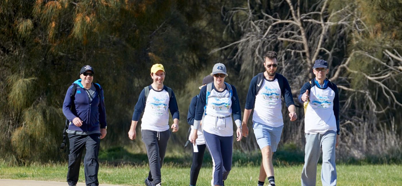 Image: Marathon walkers participate in the Blue Dragon Marathon Walk. (Photo Credit: Intrepid Travel)