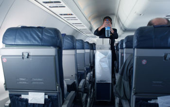 Flight attendant with beverage cart